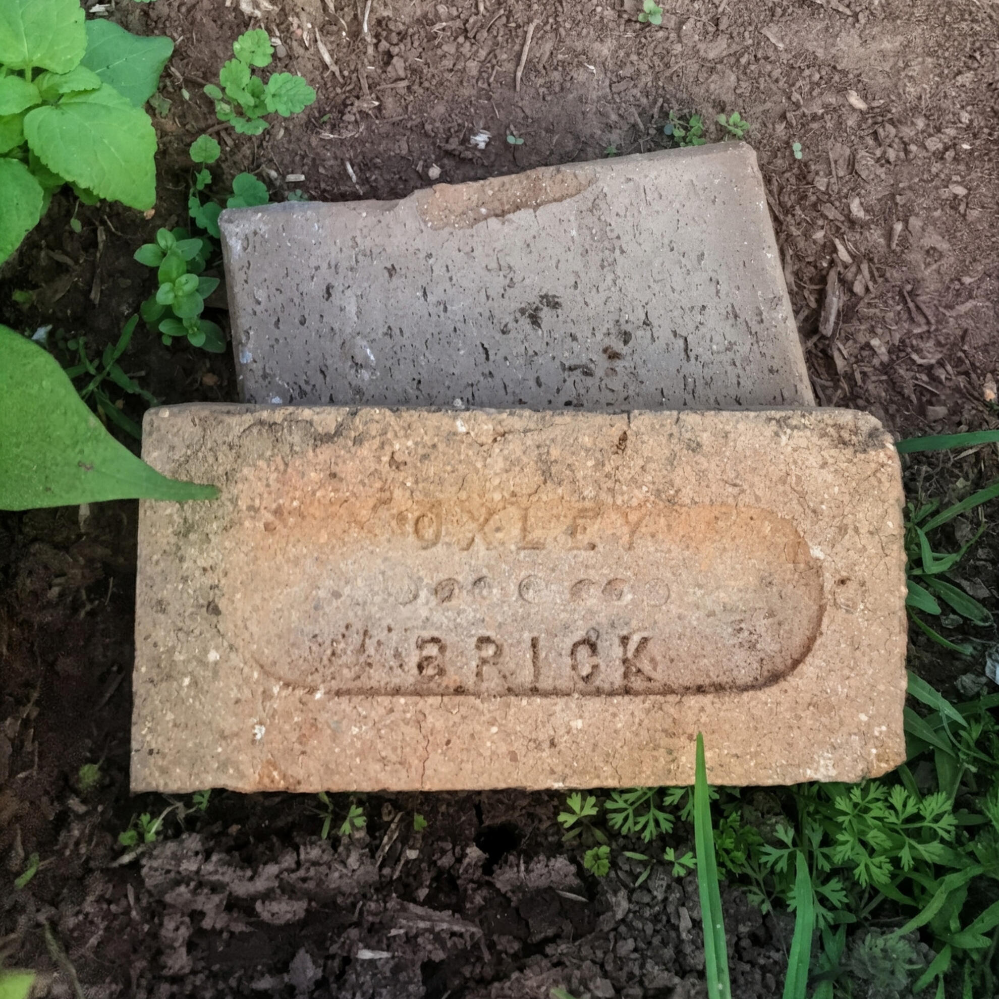 Historical Stamped Oxley Brick Detail Studio Violett Oxley Farmhouse historic clay brick stamped with Oxley Brick lettering highlighting local site heritage and materiality